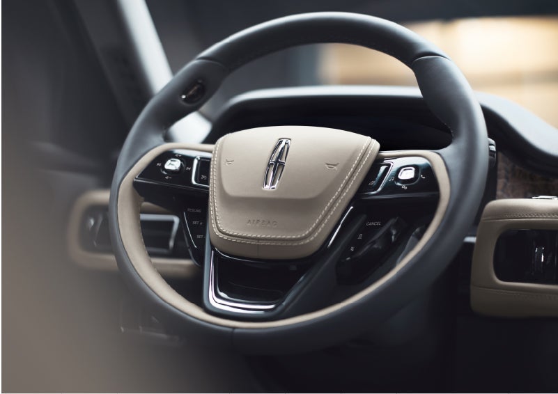 The intuitively placed controls of the steering wheel on a 2023 Lincoln Aviator® SUV | Sedano Lincoln in La Mesa CA