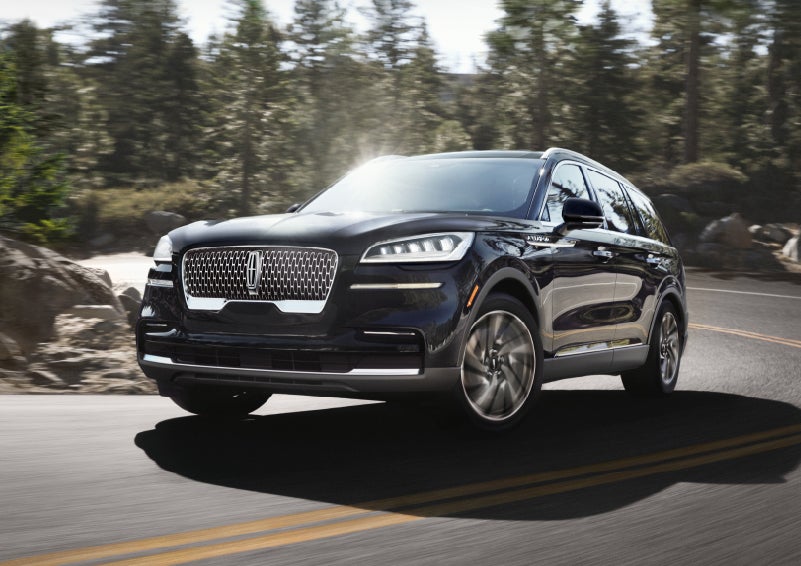 A Lincoln Aviator® SUV is being driven on a winding mountain road | Sedano Lincoln in La Mesa CA