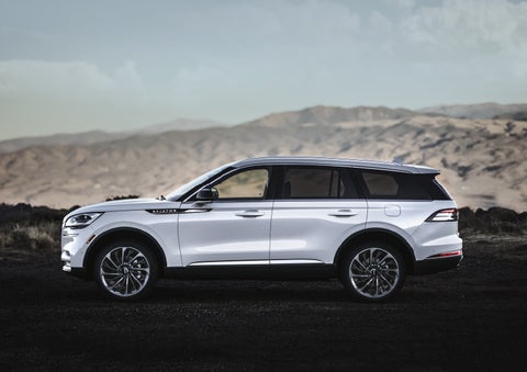 A Lincoln Aviator® SUV is parked on a scenic mountain overlook | Sedano Lincoln in La Mesa CA