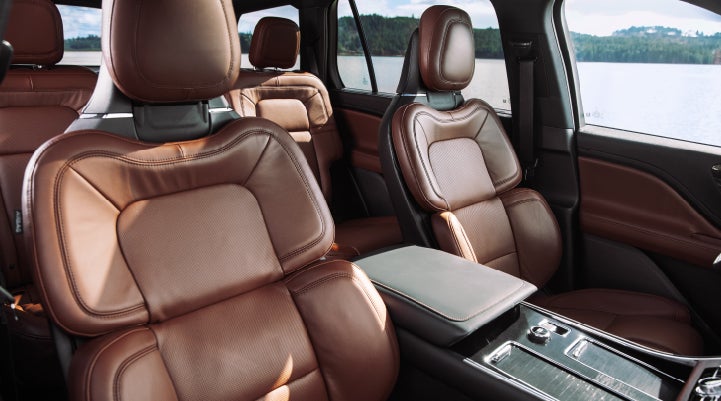 The front row's Perfect Position Seats in a 2024 Lincoln Aviator® Reserve model with Ebony Roast interior | Sedano Lincoln in La Mesa CA
