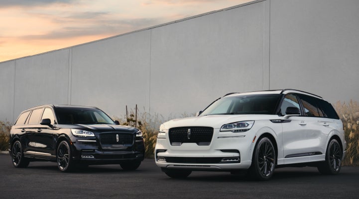 Two Lincoln Aviator® SUVs are shown with the available Jet Appearance Package | Sedano Lincoln in La Mesa CA