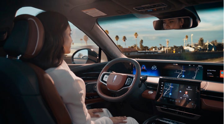 A person is shown driving hands-free on the highway with available Lincoln BlueCruise technology. | Sedano Lincoln in La Mesa CA