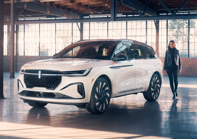 A person approaches a 2024 Lincoln Nautilus® SUV. | Sedano Lincoln in La Mesa CA