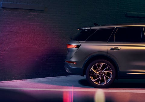 A dramatization of a 2025 Lincoln Corsair® SUV is shown backing up toward a wall. | Sedano Lincoln in La Mesa CA