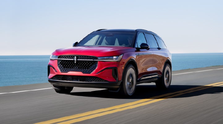 A 2025 Lincoln Nautilus® SUV is being driven on a seaside roadway. | Sedano Lincoln in La Mesa CA