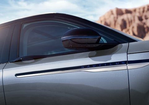 Blue lettering on the side of the vehicle that reads nautilus indicates the available hybrid powertrain. | Sedano Lincoln in La Mesa CA