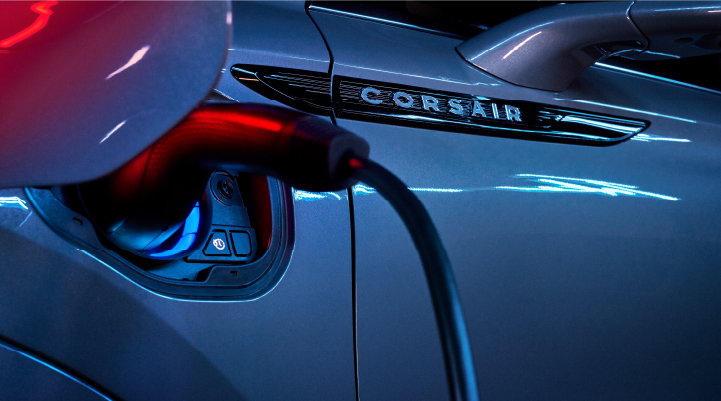 A charger plugged into the charging port of a 2025 Lincoln Corsair® Plug-in Hybrid model. | Sedano Lincoln in La Mesa CA