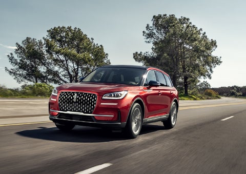 A 2026 Lincoln Corsair® SUV is shown being driven on a country road. | Sedano Lincoln in La Mesa CA
