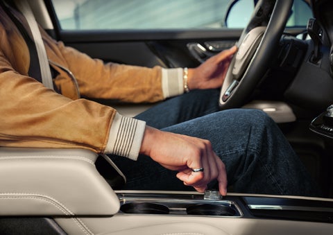 The driver of a 2026 Lincoln Corsair® SUV is shown selecting a drive mode. | Sedano Lincoln in La Mesa CA