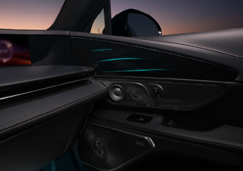 Selectable ambient lighting glows in the passenger door panel. | Sedano Lincoln in La Mesa CA