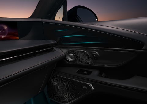 Selectable ambient lighting glows in the passenger door panel. | Sedano Lincoln in La Mesa CA