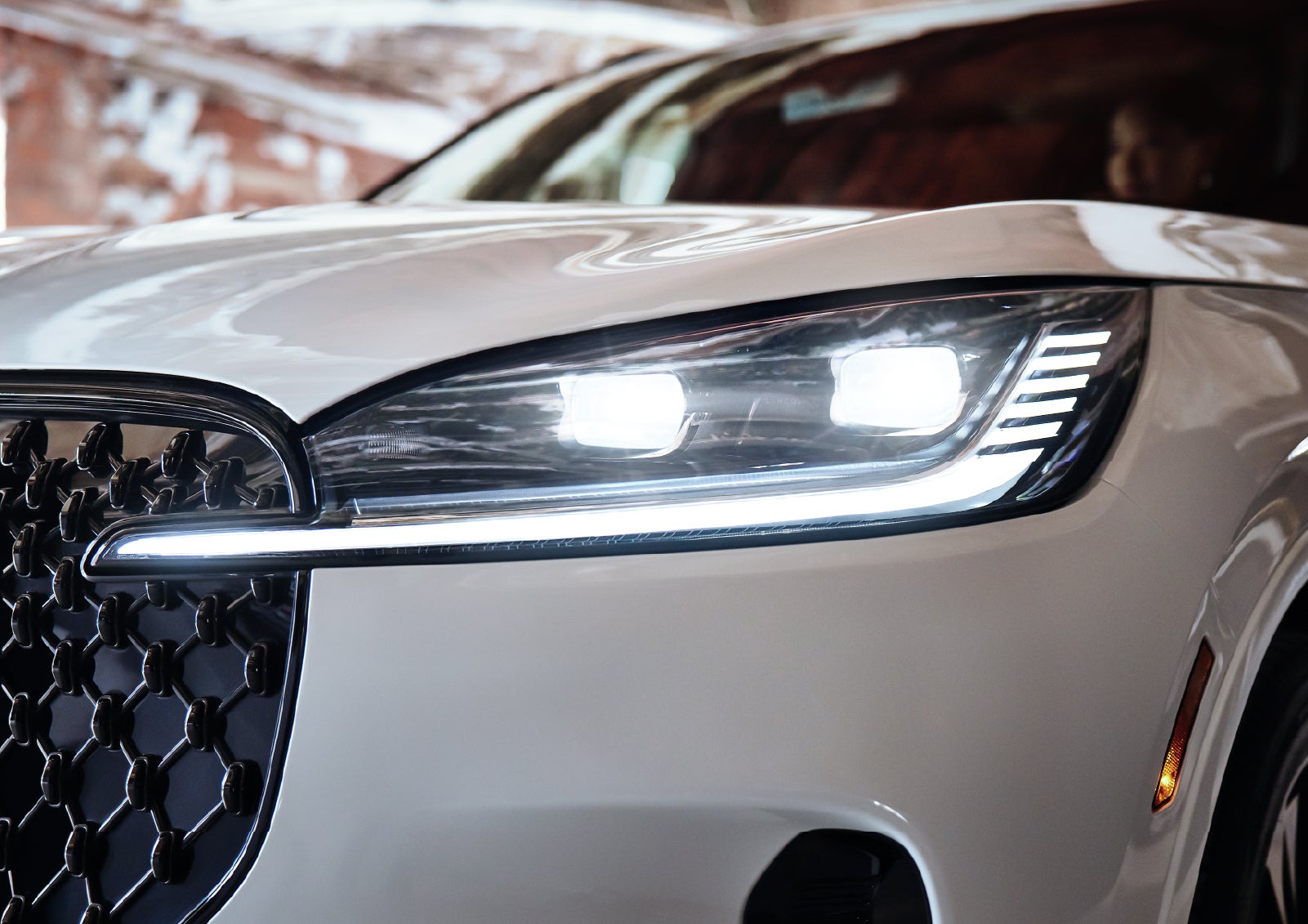 A close-up of a headlamp on the 2027 Lincoln Aviator® SUV is shown. | Sedano Lincoln in La Mesa CA