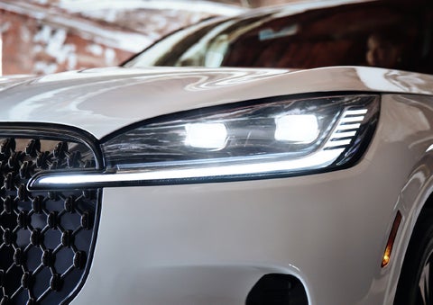 A close-up of a headlamp on the 2027 Lincoln Aviator® SUV is shown. | Sedano Lincoln in La Mesa CA